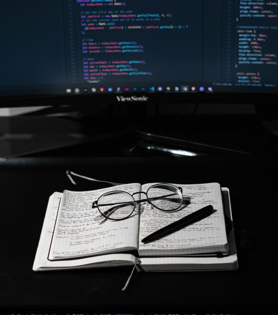 Technical writing services and IT documentation workspace with code and notes